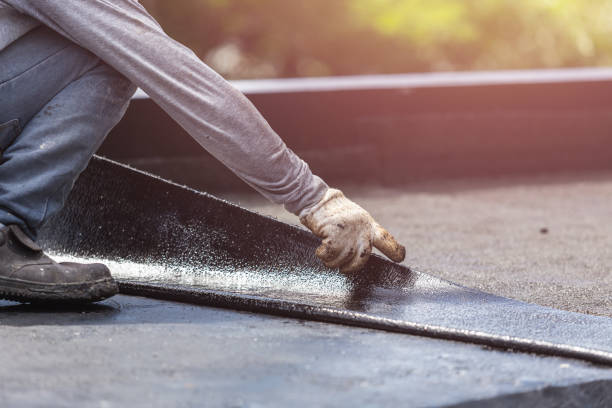 Professional Basement Waterproofing technician working in Springfield, IL